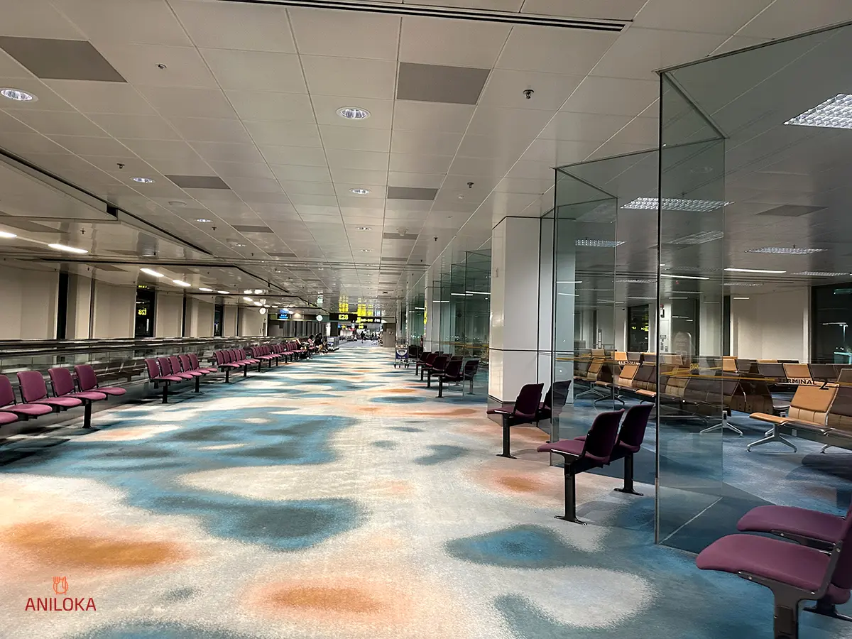 Seating Area outside and inside boarding gate Changi Airport Singapore